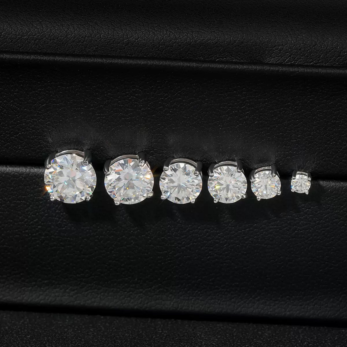 Classic Round Four-Prong Moissanite Stud Earrings in 925 sterling silver with moissanite